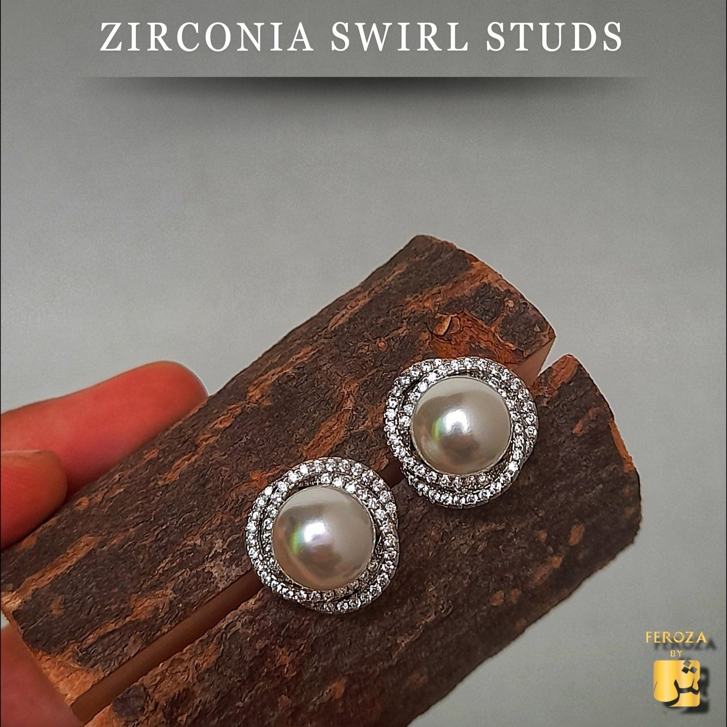 Zirconia Swirl Studs Earrings